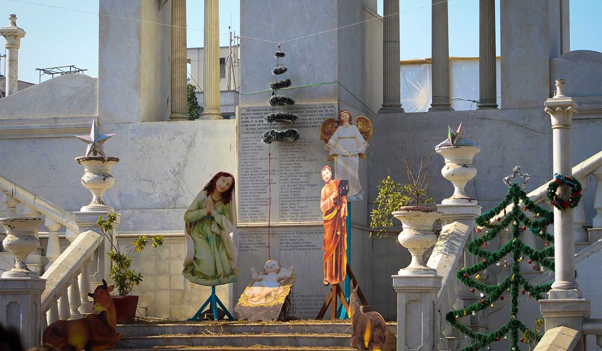 Life-size cardboard structures of the Christmas Eves scene placed across the cathedrals structure.