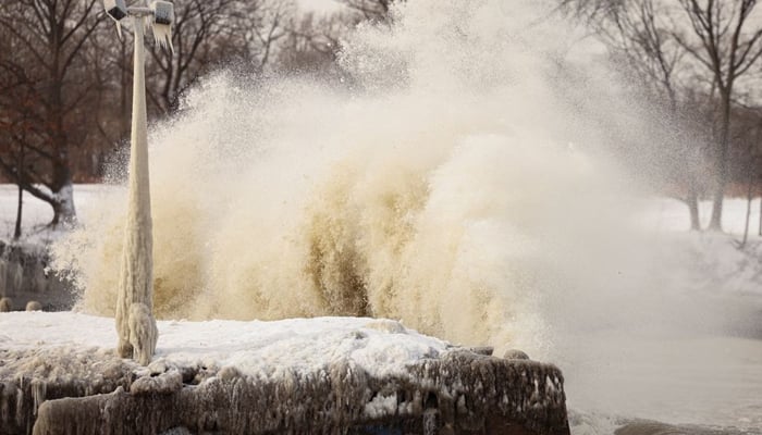 Ice forms by the spray of Lake Erie waves during a winter storm in Silver Creek, New York, U.S., December 24, 2022 — REUTERS