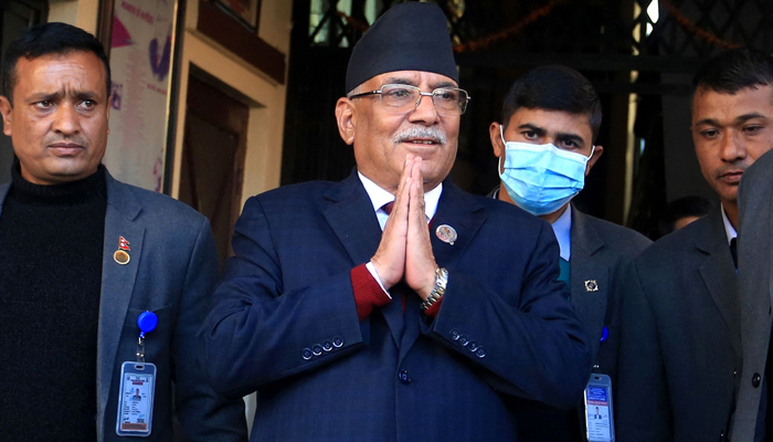 Nepal´s former guerrilla leader Pushpa Kamal Dahal (2L), better known by his nom de guerre Pra — AFP