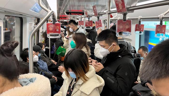 Commuters ride a subway train during the morning rush hour amid the coronavirus disease (COVID-19) outbreak, in Shanghai, China December 26, 2022. — Reuters