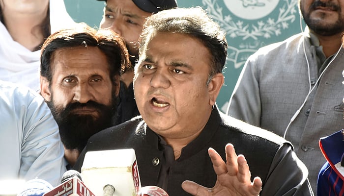 PTI leader Fawad Chaudhry speaks to journalists outside the Election Commission of Pakistans office in Islamabad on October 21, 2022. — Online