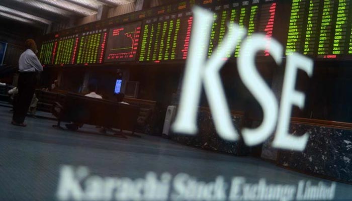 An undated image of Benchmark KSE-100 index board reflected through the mirror of the Pakistan Stock Exchange. — AFP