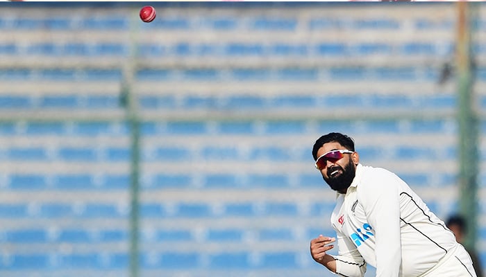 New Zealand´s Ajaz Patel delivers a ball during the second day of the first cricket Test match between Pakistan and New Zealand at the National Stadium in Karachi on December 27, 2022. — AFP