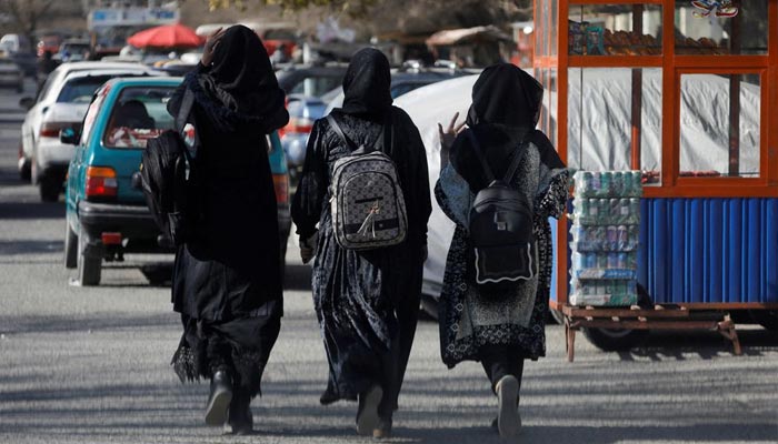 Afghan female students walk near Kabul University in Kabul, Afghanistan, December 21, 2022. — Reuters