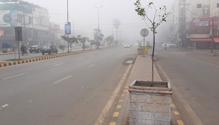 A daylight view of a Lahore area blanketed in fog on December 21, 2022. Twitter