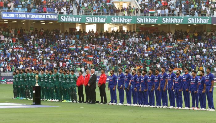 Cricket - Asian Cup - India v Pakistan - Dubai International Stadium, Dubai, United Arab Emirates - August 28, 2022 India and Pakistan players line up before the match.— Reuters
