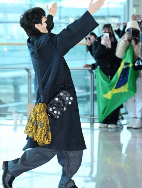 BTS J-Hope dances at airport as he leaves for New Years Rockin Eve performance