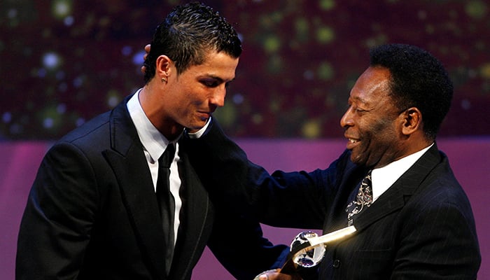 Cristiano Ronaldo of Portugal receives the FIFA World Player 2008 award from football legend Pele during the FIFA World Player of the Year awards ceremony in Zurich, Switzerland, January 12, 2009. — Reuters