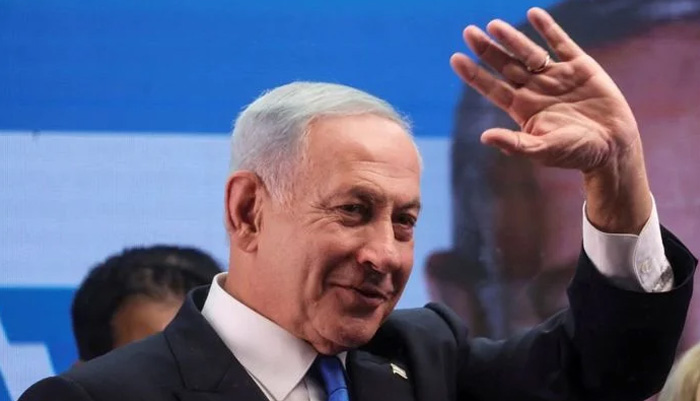 Former Israeli Prime Minister Benjamin Netanyahu gestures as he addresses his supporters from a truck at a campaign event in the run-up to Israels election in Or Yehuda, Israel October 30, 2022.— Reuters
