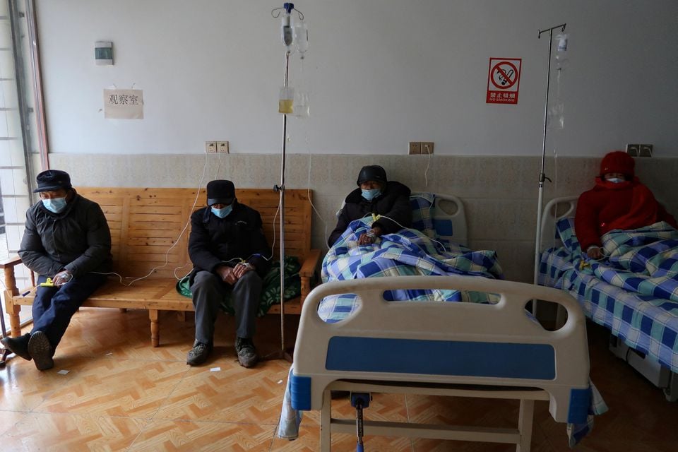 Elderly patients receive IV drip treatment at a clinic in a village of Lezhi county after strict measures to curb the coronavirus disease (COVID-19) were removed nationwide, in Ziyang, Sichuan province, China December 29, 2022.— Reuters