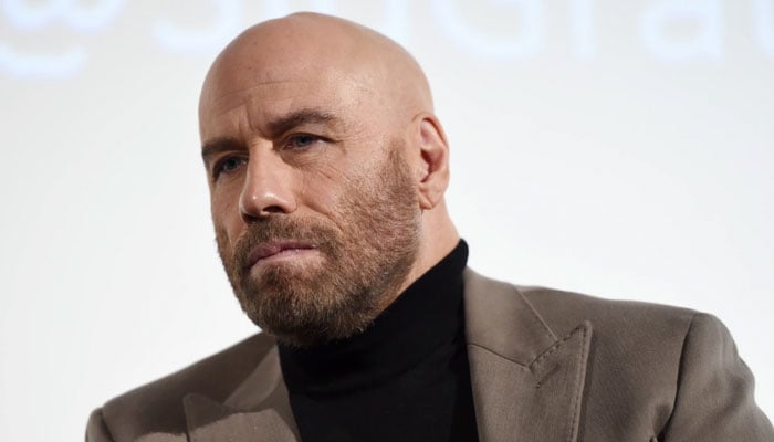 John Travolta finds cancer death 'very horrific' of woman close to him