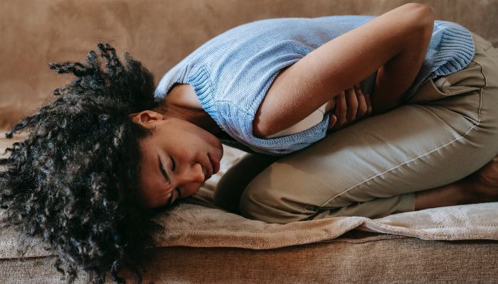 Woman Suffering from a Stomach Pain.— Pexels