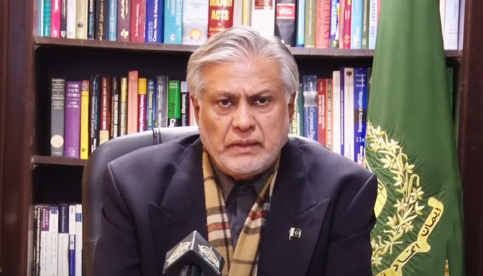 Finance Minister Ishaq Dar announces petrol prices during a press conference on December 31, 2022. — YouTube/PTVNewsLive