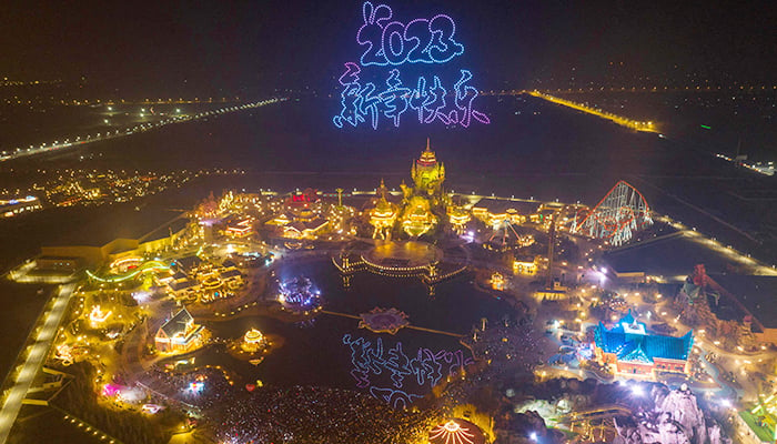 This aerial photo taken on December 31, 2022, shows 2023 written in the sky by a drone formation over the Xiyou World theme park ahead of the new year in Huaian, in Chinas eastern Jiangsu province. — AFP