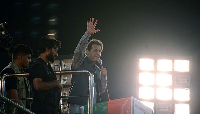 Pakistan Tehreek-e-Insaf Chairman Imran Khan addressing a public gathering at Iqbal Stadium onSeptember 4, 2022. — APP