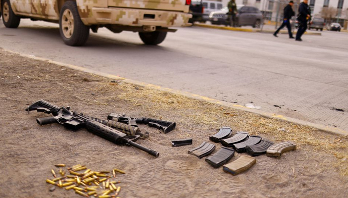 Guns and bullets are seen in front of the Cereso state prison number 3 — Reuters