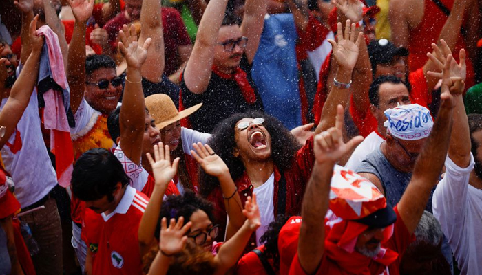 Supporters of Brazils President elect Luiz Inacio Lula da Silva gather outside the Planalto Palace ahead of Lulas swear-in ceremony, in Brasilia, Brazil, January 1, 2023 — Reuters