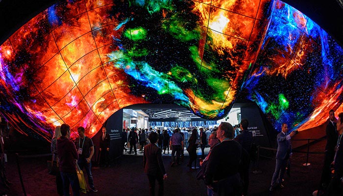 Attendees experience the LG OLED Wave made up of 200 55-inch LG OLED digital screens on the final day of the 2020 Consumer Electronics Show (CES) in Las Vegas, Nevada on January 10, 2020. — AFP