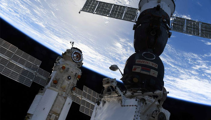The Soyuz MS-18 spacecraft photographed next to Nauka (Science) Multipurpose Laboratory on July 29, 2021. — Reuters