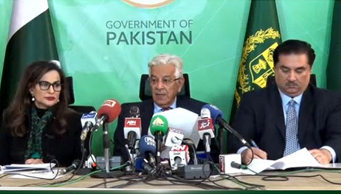 Federal Ministers Sherry Rehman, Khawaja Asif, and Khurram Dastagir Khan address a press conference after a federal cabinet meeting. — Screengrab/PTV