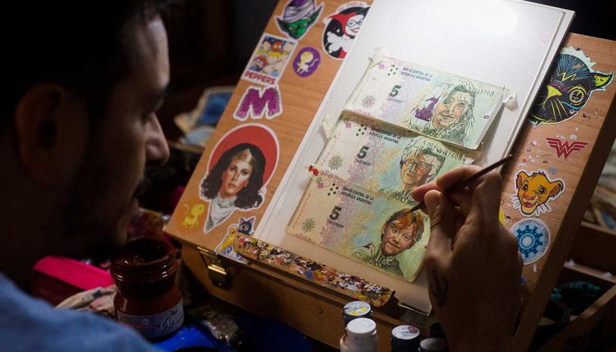 Artist Sergio Diaz intervenes Argentine pesos bills with characters of the movie Harry Potter, as he revalues the bills by transforming them into artwork against Argentinas ever-increasing inflation, in Salta, Argentina, December 30, 2022. — Reuters