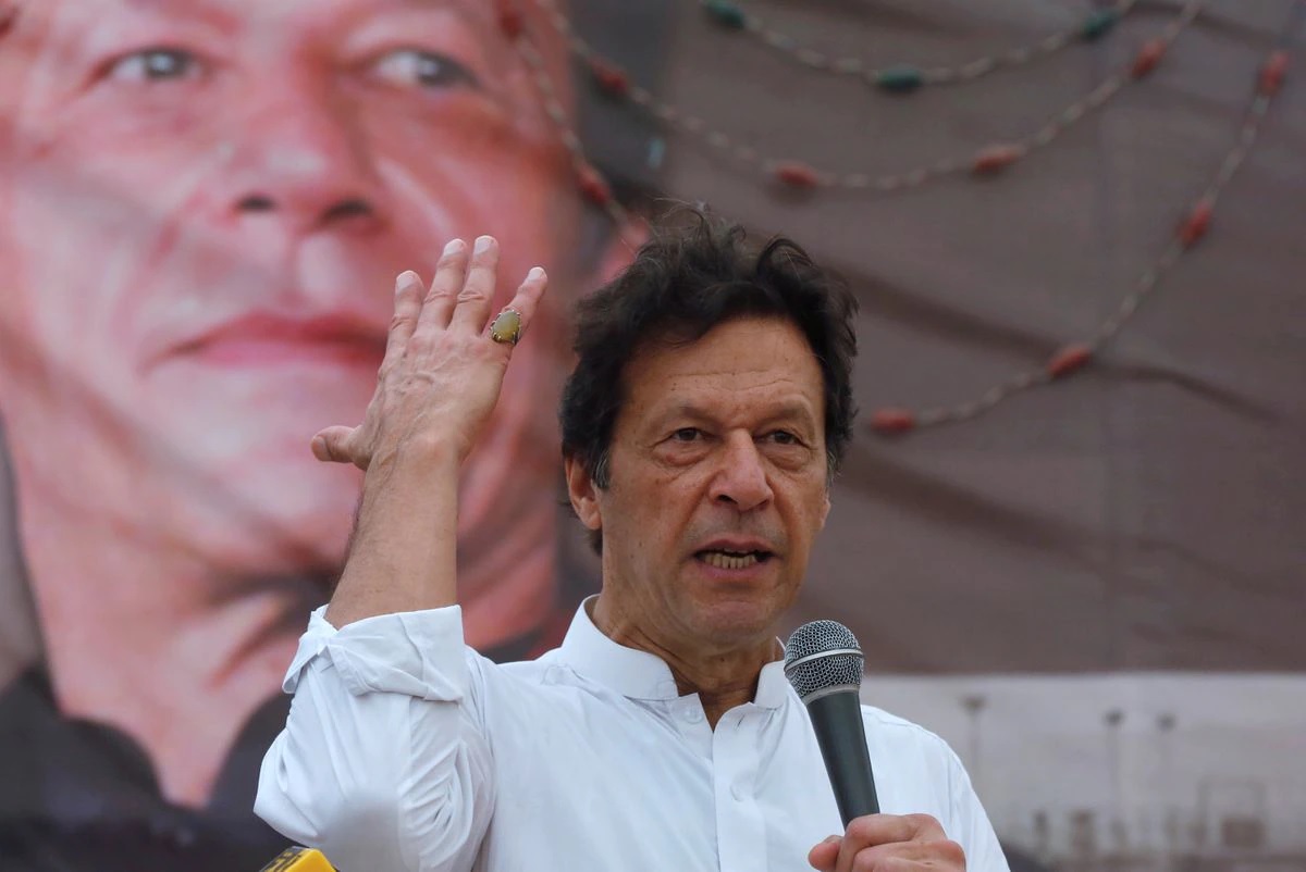 Imran Khan, chairman of the Pakistan Tehreek-e-Insaf (PTI), gestures while addressing his supporters during a campaign meeting ahead of general elections in Karachi, July 4, 2018.— Reuters