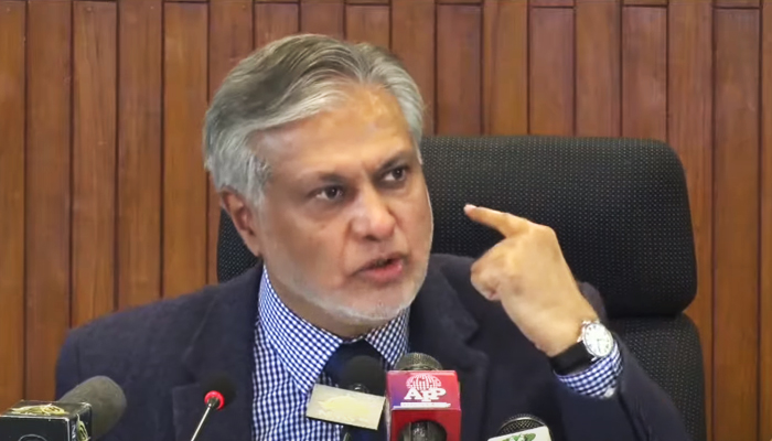 Finance Minister Senator Ishaq Dar addresses a press conference alongside federal and state ministers (not pictured) in Islamabad on January 4, 2023. — YouTube/PTVNewsLive