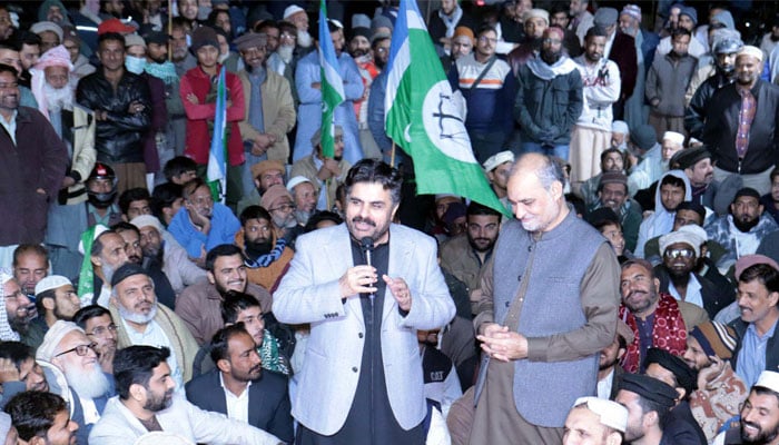 Sindh Local Government Minister Syed Nasir Hussain Shah addresses during the protest demonstration of Jamat-e-Islami against postponement of the local government elections in Karachi. — PPI