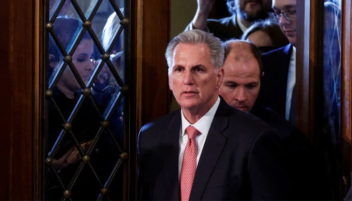 House Republican Leader Kevin McCarthy passes reporters as he returns to House Chamber. — Reuters