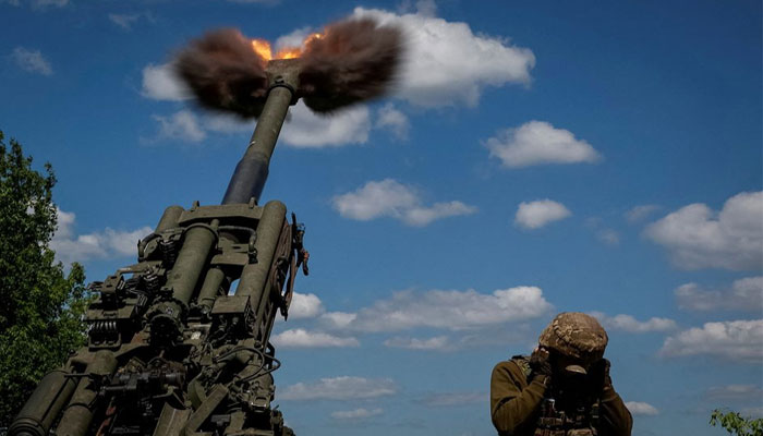 Ukrainian service member fire a shell from a M777 Howitzer near a frontline, as Russias attack on Ukraine continues, in Donetsk Region, Ukraine. Reuters/File