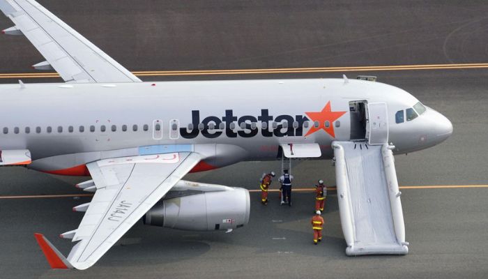 An aerial view shows a Jetstar plane after the budget carrier made an emergency landing following a bomb threat at Chubu Centrair International Airport in Tokoname, central Japan, in this photo taken by Kyodo January 7, 2023.— Reuters