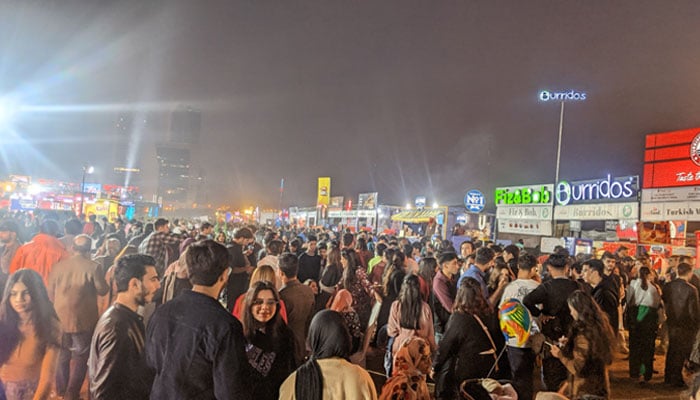 Crowds piling up as the sun sets at Karachi Eat festival at Beach view park Clifton. — reporter