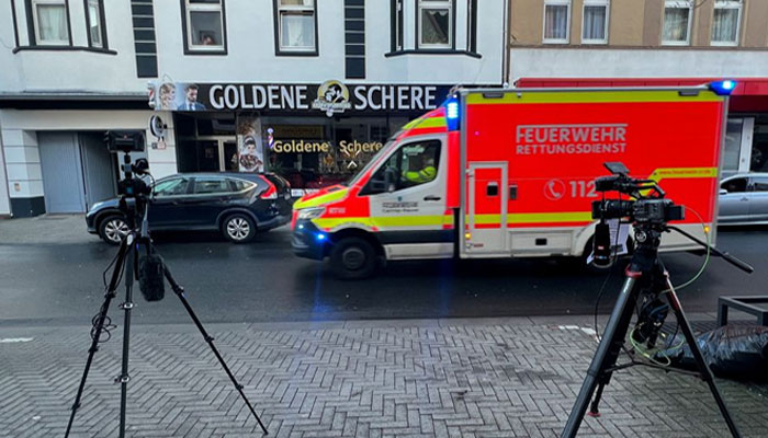 TV cameras are set up in front of a building where German police have taken a 32-year-old Iranian citizen into custody in Castrop-Rauxel, Germany, January 8, 2023. — Reuters