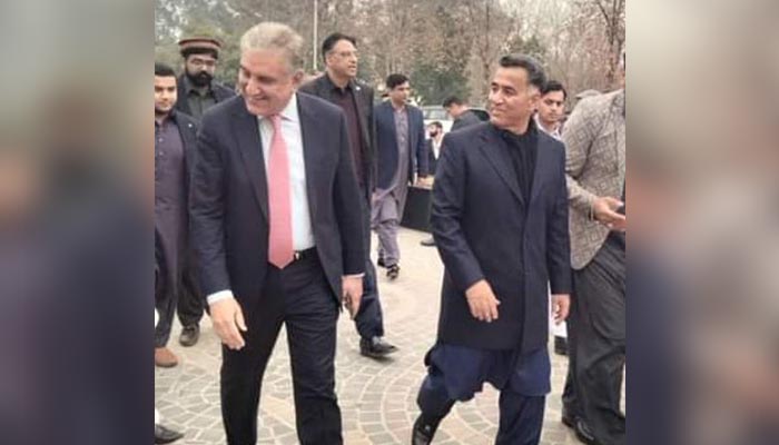 PTI leaders Shah Mahmood Qureshi and Asad Umar at former chief of the Inter-Services Intelligence (ISI) Lt Gen (retd) Faiz Hamid's daughter's wedding. — Twitter 