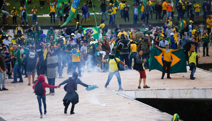 Supporters of Brazils former president Jair Bolsonaro demonstrating — Reuters
