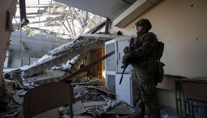 A Ukrainian serviceman amid Russias attack on Ukraine, in Donetsk region, Ukraine. — Reuters