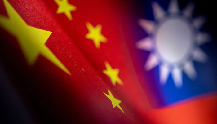 Chinese and Taiwanese printed flags are seen in this illustration.  — Reuters
