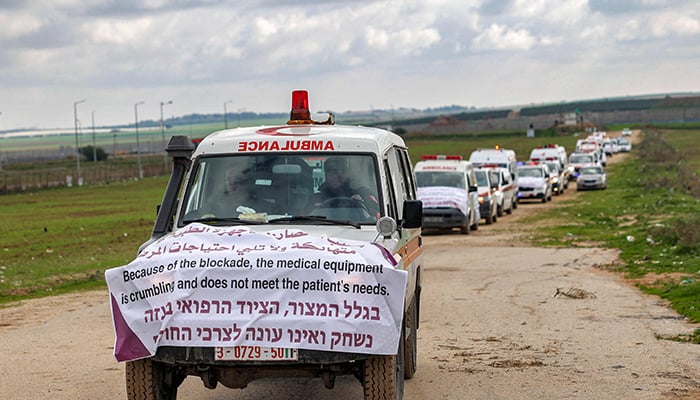 A convoy of Palestinian ambulance vehicles moves along the border fence between Israel and the Gaza Strip east of Gaza City on January 9, 2023, during a protest against Israels prevention of allowing diagnostic medical equipment to enter hospitals in the Palestinian enclave. — AFPEquipment is used to treat patients in intensive care and stoke.Palestinians say it puts the lives of patients at risk.The equipment could be used for military purposes, says Israel.