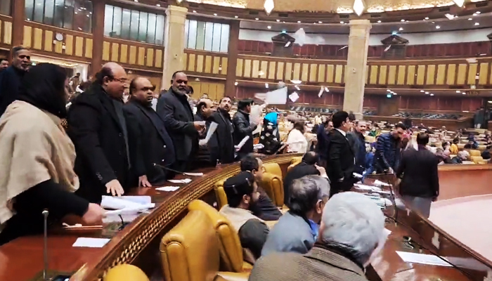 Punjab Assembly lawmakers protest and chant slogans during an ongoing session of the house in Lahore on January 11, 2023. — Twitter/@MurtazaViews