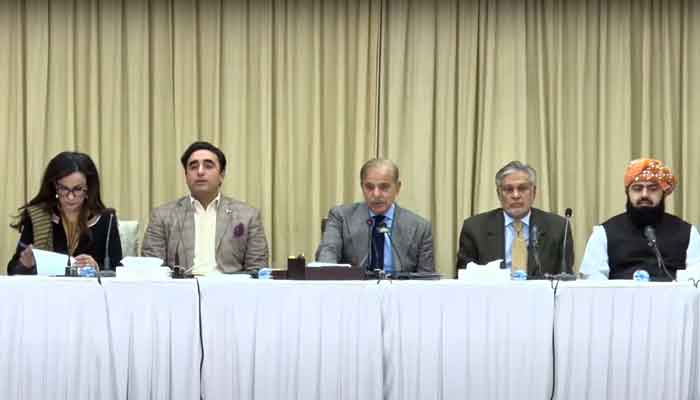 Prime Minister Shehbaz Sharif, flanked by federal minsters from coalition parties, addresses a press conference in Islamabad. Screengrab