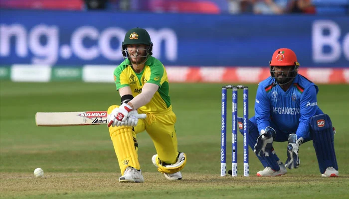 David Warner Australia memukul selama pertandingan penyisihan grup Piala Dunia Kriket 2019 antara Afghanistan dan Australia di Bristol County Ground di Bristol, barat daya Inggris, pada 1 Juni 2019. Australia menang dengan tujuh gawang.  —AFP