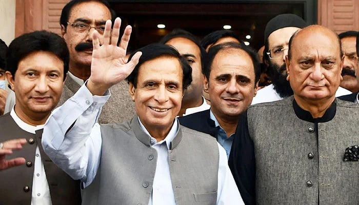 Punjab Chief Minister Parvez Elahi waves his hand outside the Punjab Assembly. — Online