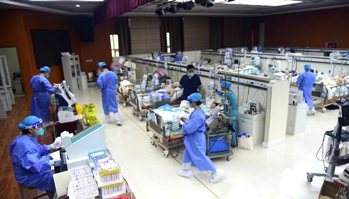 Medical workers attend to patients of the coronavirus disease (COVID-19) at an intensive care unit (ICU) converted from a conference room, at a hospital in Cangzhou, Hebei province, China January 11, 2023. — Reuters