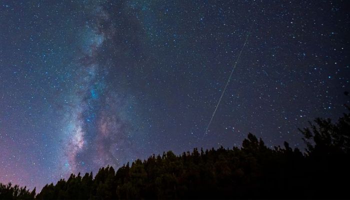 A meteor is photographed near the Milky Way during the annual Perseid meteor shower in Pico de las Nieves, on the island of Gran Canaria, Spain, August 13, 2021.— Reuters