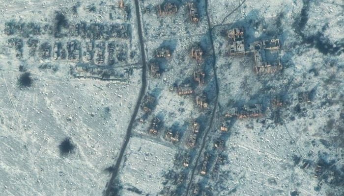 A satellite view shows a destroyed school and buildings in south Soledar, Ukraine, January 10, 2023.— Satellite image 2023 Maxar Technologie via Reuters