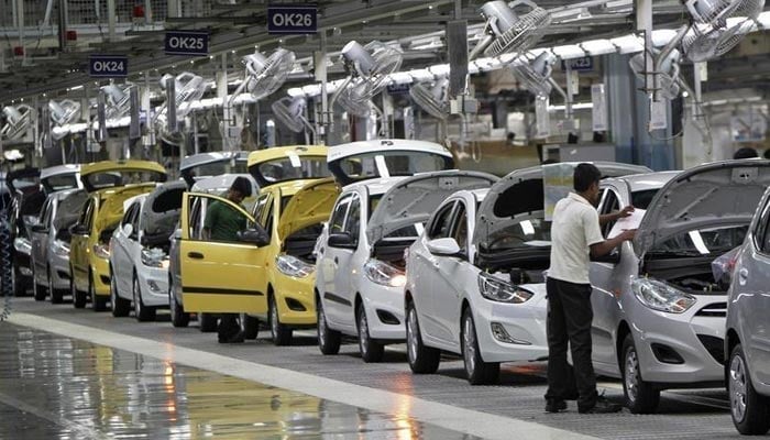 Workers assemble cars inside the Hyundai Motor India Ltd. plant at Kancheepuram district in the southern Indian state of Tamil Nadu October 4, 2012. — Reuters/File