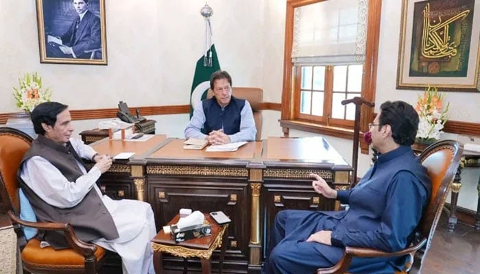 Former prime minister Imran Khan meets Chief Minister Pervez Elahi and Moonis Elahi at the CM Office. — Courtesy CM Media