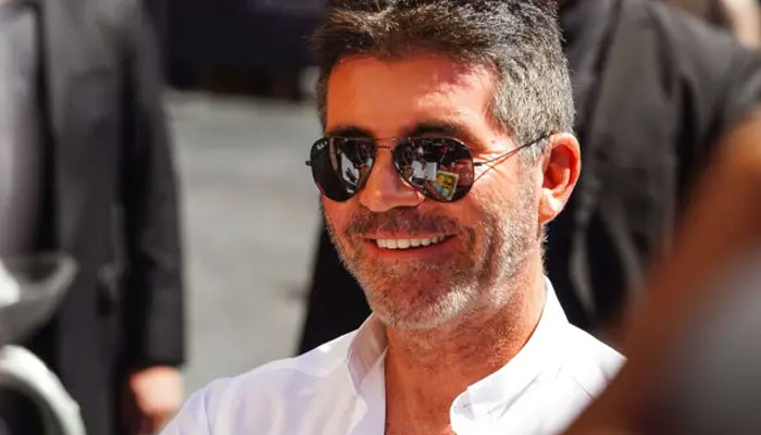 Simon Cowell menahan diri untuk tidak mengambil gaji setelah laba di Syco turun