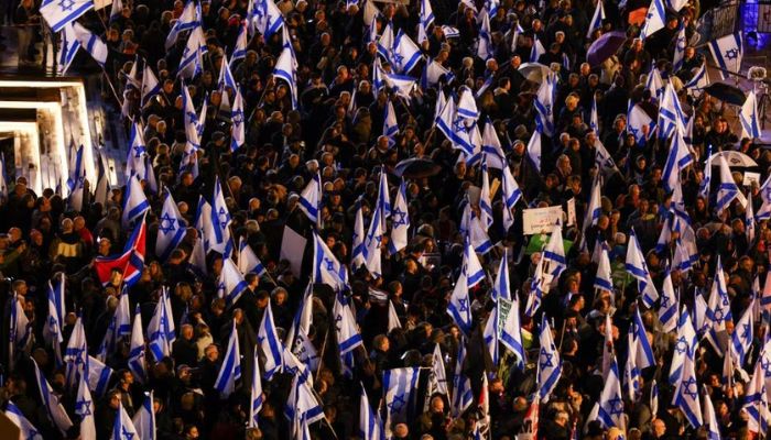 Israelis protest against Prime Minister Benjamin Netanyahus new right-wing coalition and its proposed judicial reforms to reduce powers of the Supreme Court in a main square in Tel Aviv, Israel January 14, 2023.— Reuters