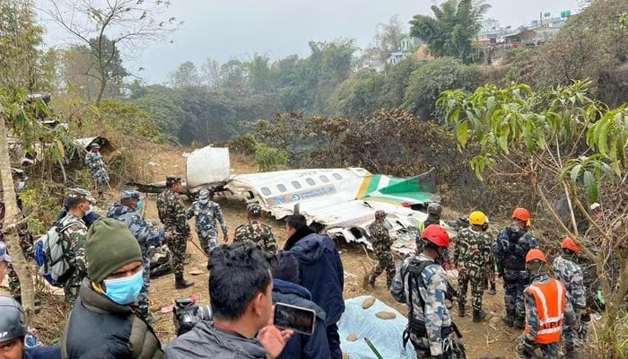 Rescue teams work to retrieve bodies from the wreckage of the crash of a Yeti Airlines operated aircraft, in Pokhara, Nepal January 16, 2023. — Reuters